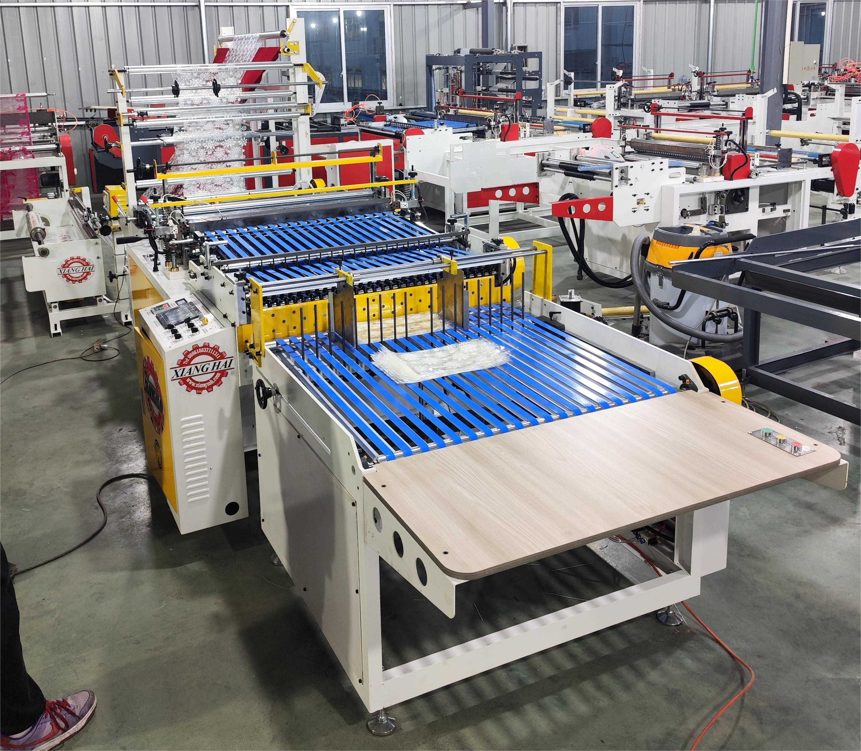Algerian customer online test machine，laptop side sealing bag making machine.