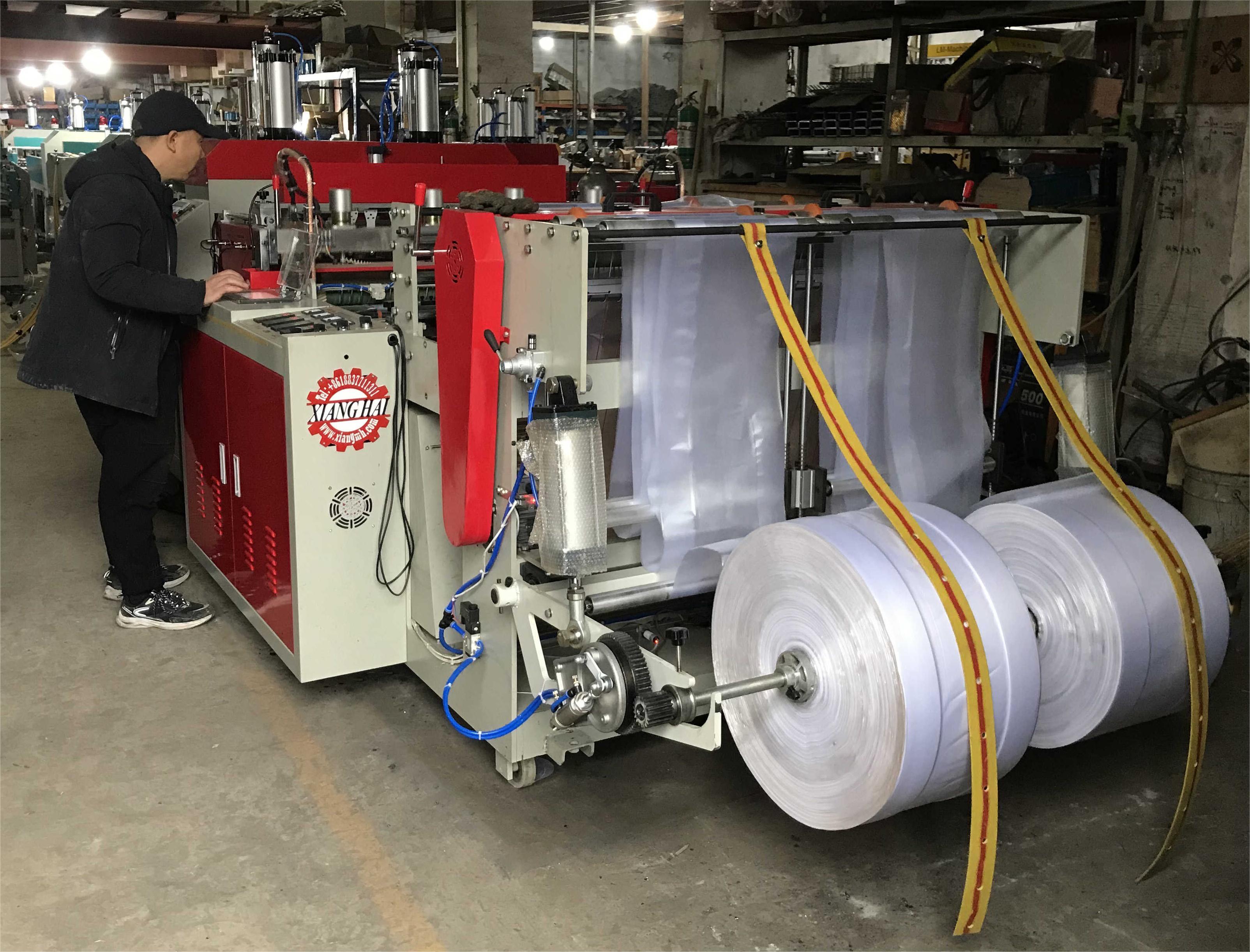 Moroccan customer online check his machine!Double line T-shirt bag making mahcine.